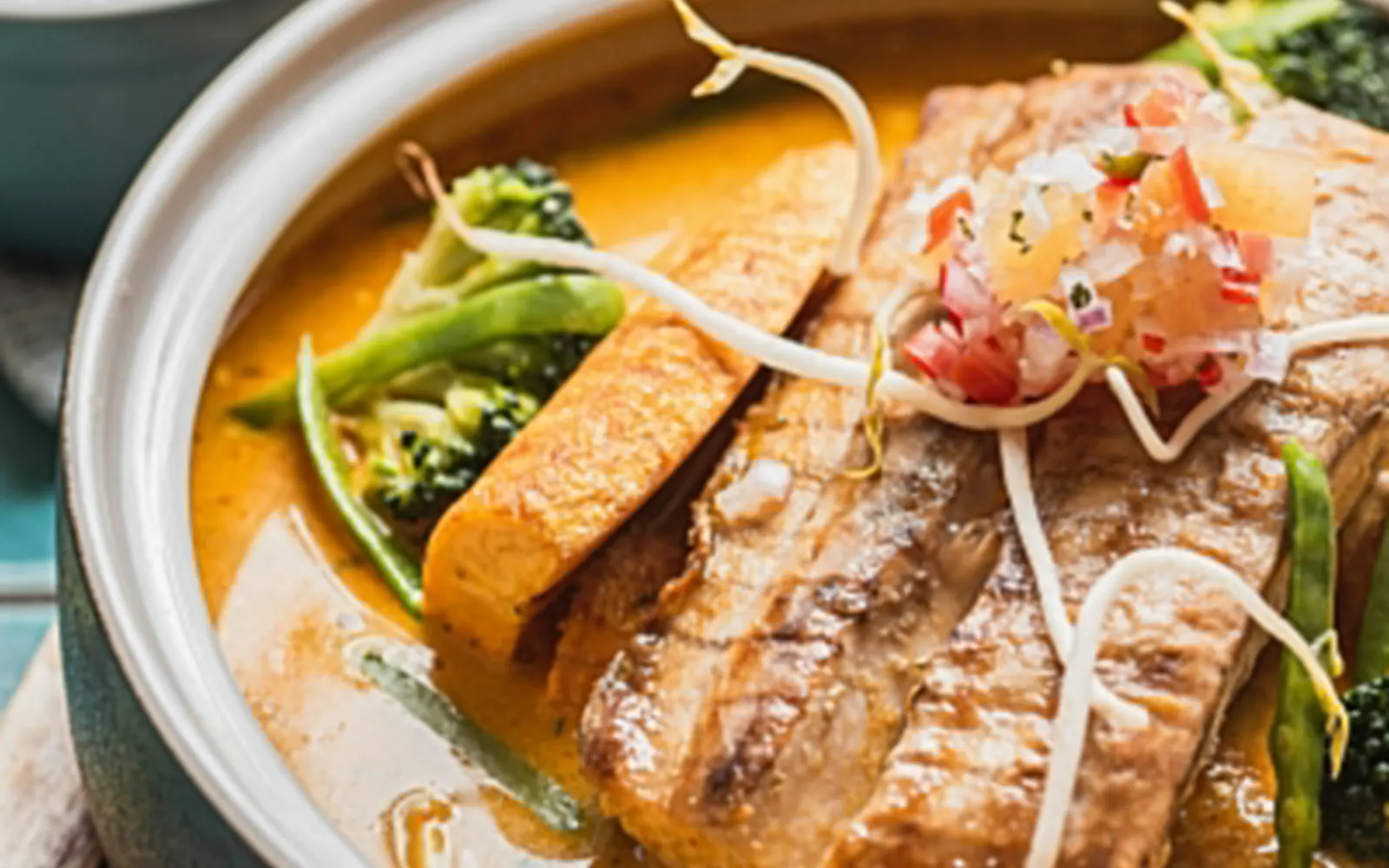 A dish in a cast-iron pan on a restaurant table